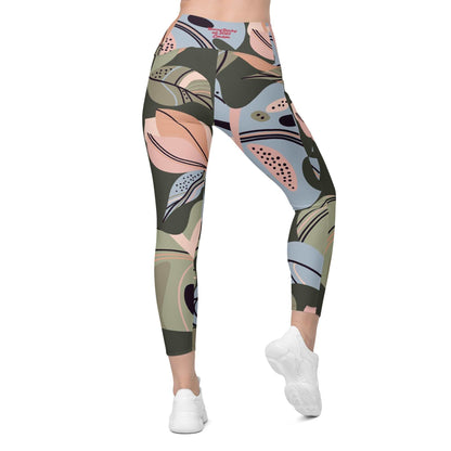 A model wearing The Barbican Sculpt Leggings, showing the sculpting fit and the pastel green and pink exotic flower print.