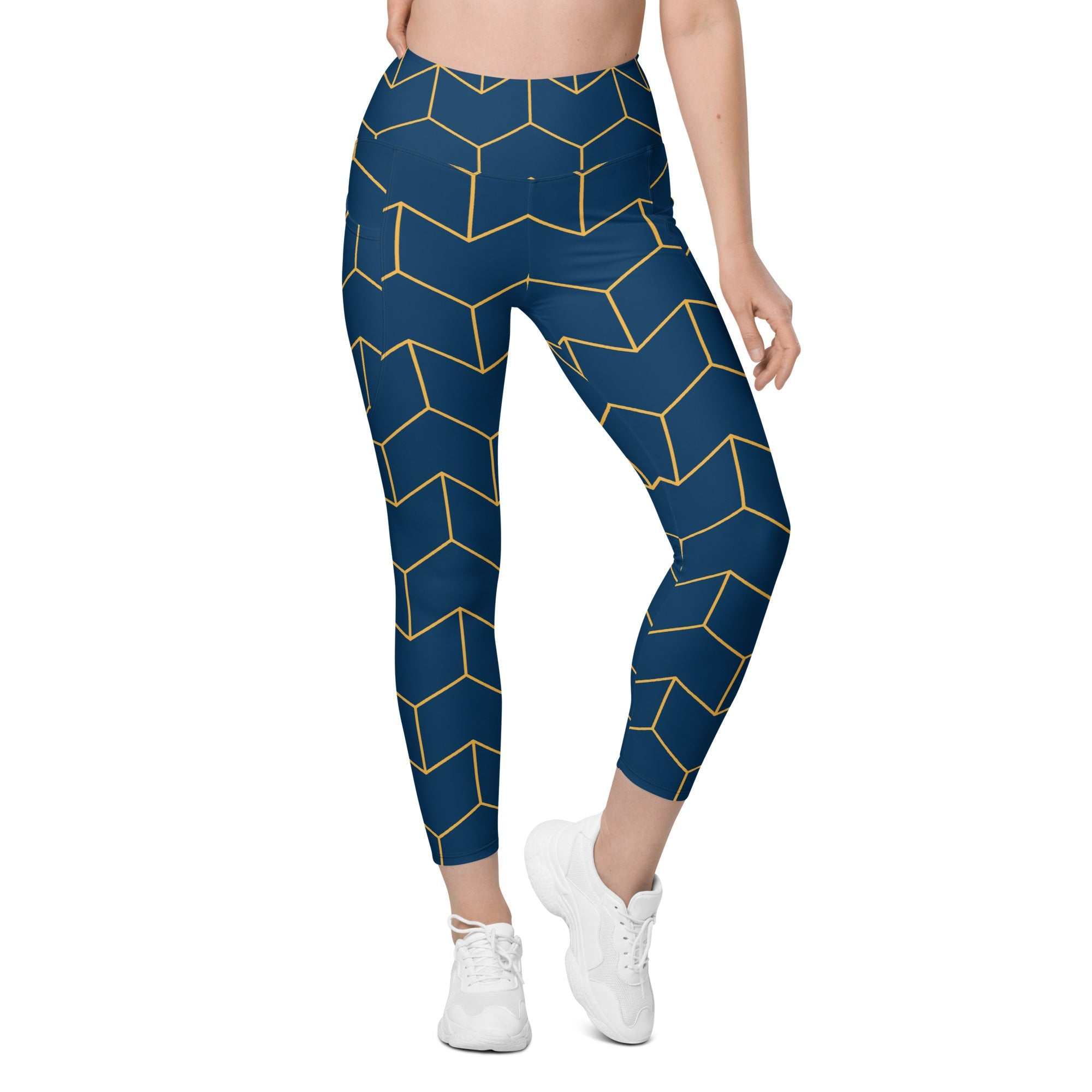 A model wearing The Barons Court Sculpt Leggings showing the matching navy and yellow Art Deco print.