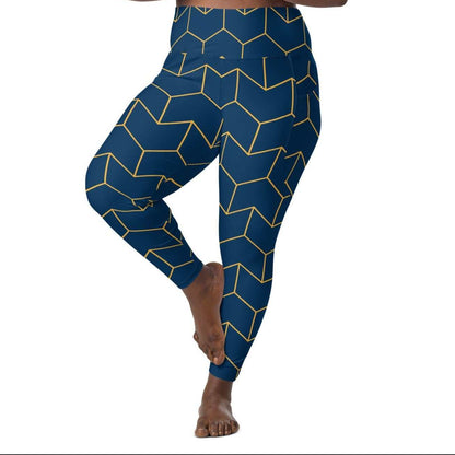 A model wearing The Barons Court Sculpt Leggings showing the matching navy and yellow Art Deco print.