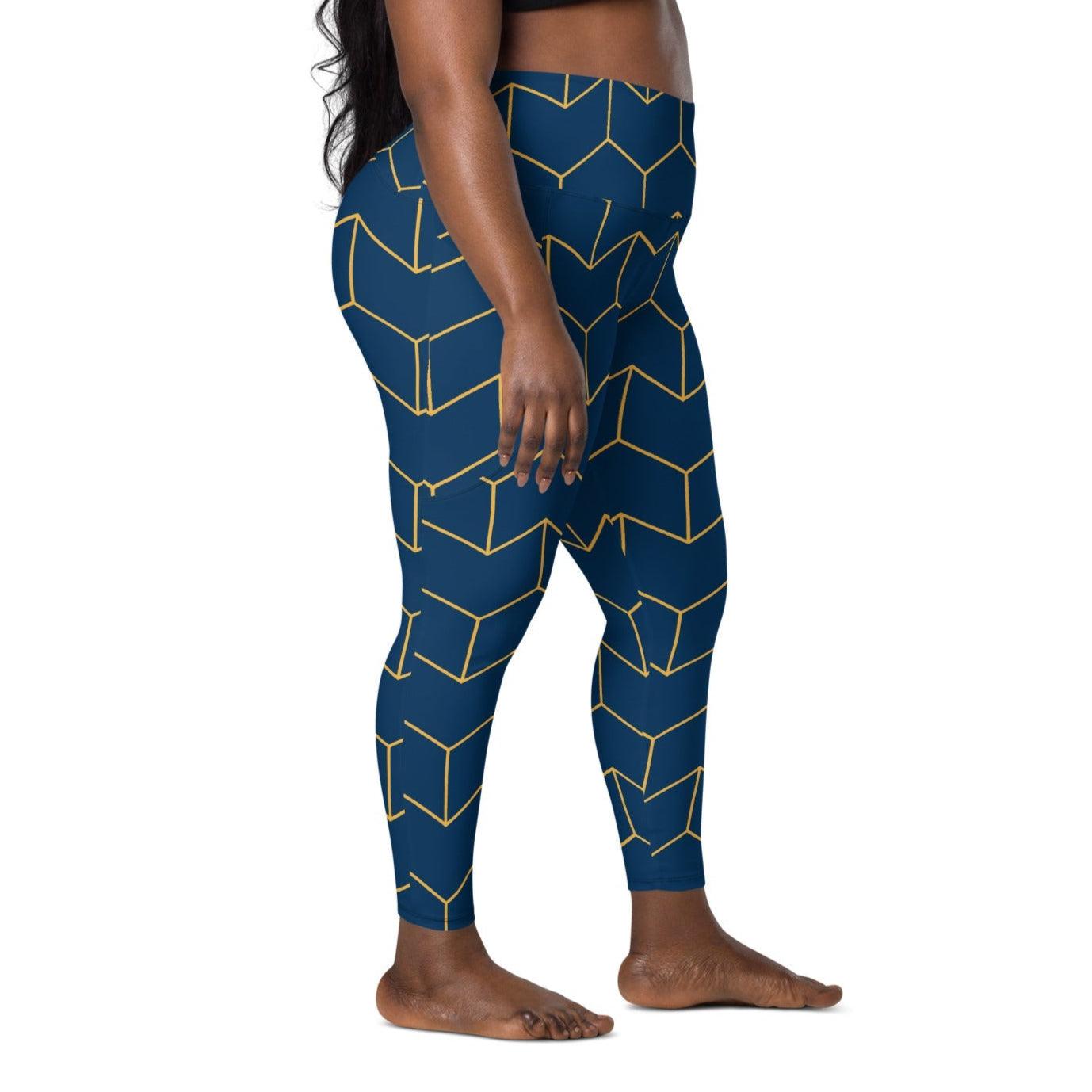 A model wearing The Barons Court Sculpt Leggings showing the matching navy and yellow Art Deco print.