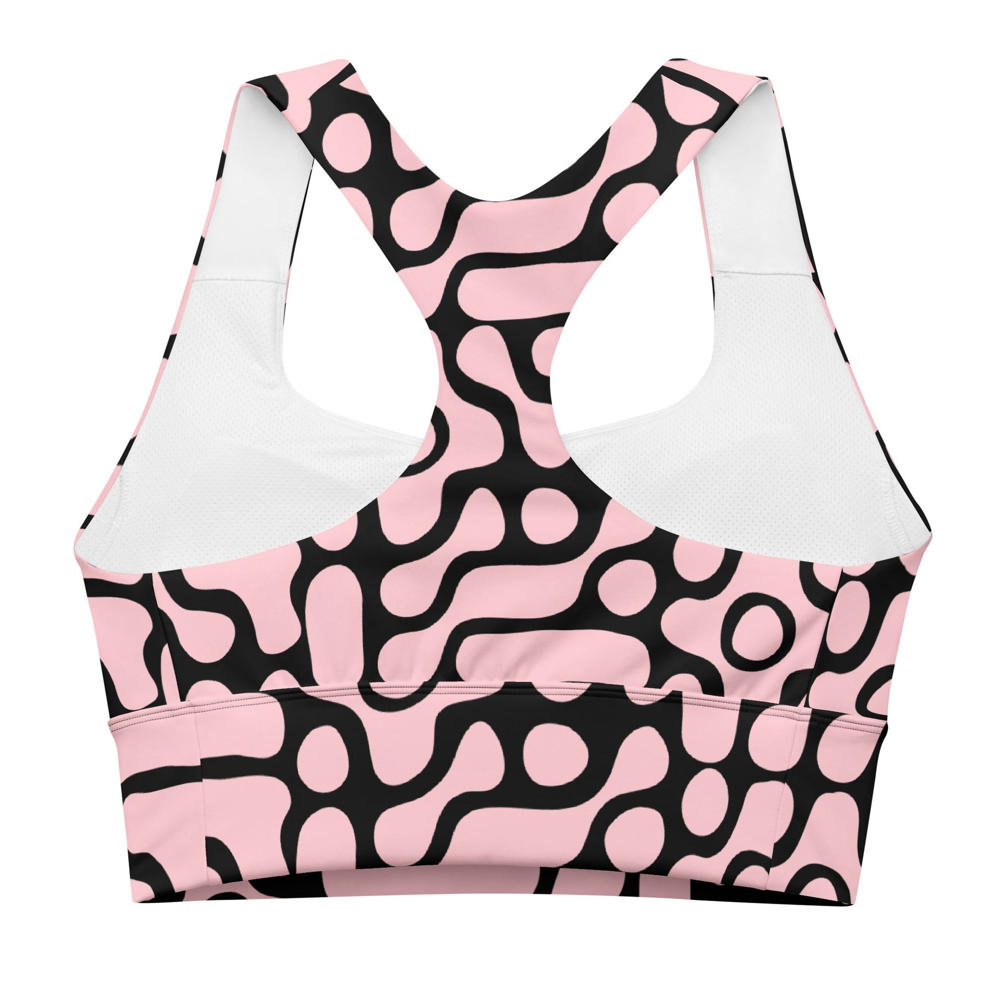 the Berlin Performance Bra in black geometric floral pattern on pink background