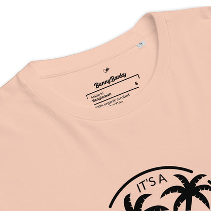 Close-up of a peach-colored t-shirt with a palm tree design and Bunny Banky branding.