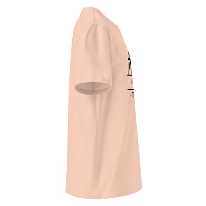 Peach coloured t-shirt  with text on a white background