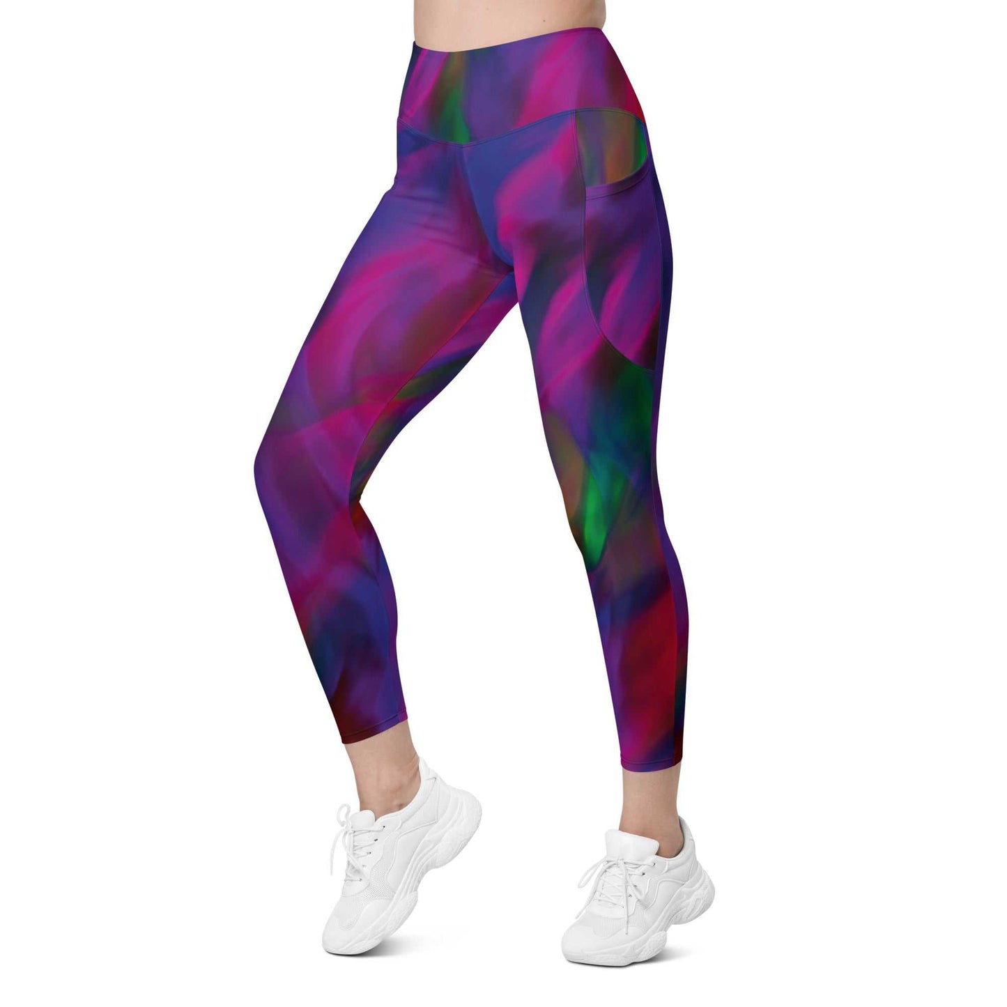 A model wearing The Bologna Sculpt Leggings, showing the high-waisted fit and the vibrant purple, pink, and green graphic print.