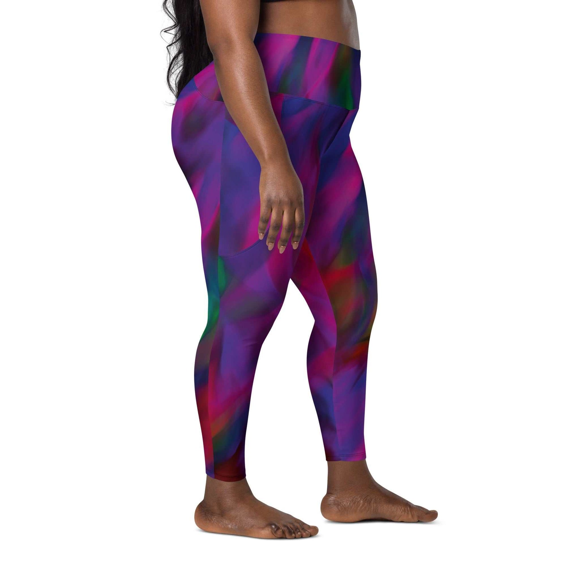 A model wearing The Bologna Sculpt Leggings, showing the high-waisted fit and the vibrant purple, pink, and green graphic print.