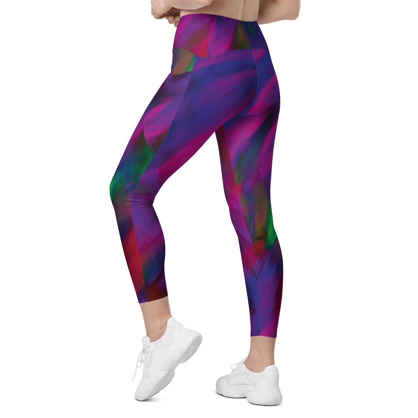A model wearing The Bologna Sculpt Leggings, showing the high-waisted fit and the vibrant purple, pink, and green graphic print.y