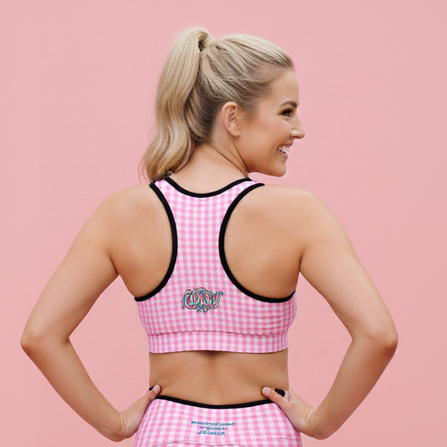 AI  Model wearing the EcoFlex performance bra. Sustainable boutique activewear featuring an artistic geometric print and elite support. Designed in our London atelier.