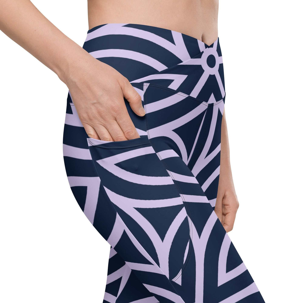 model wearing the Canary Wharf  Sculpt Crossover  Leggings in blue and lilac geometric floral pattern