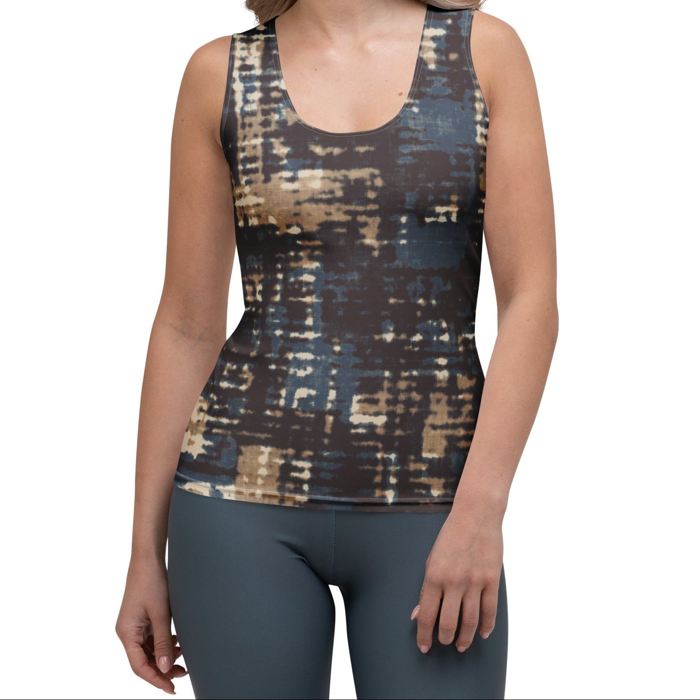 model wearing the chamonix performance tank in blue & brown print
