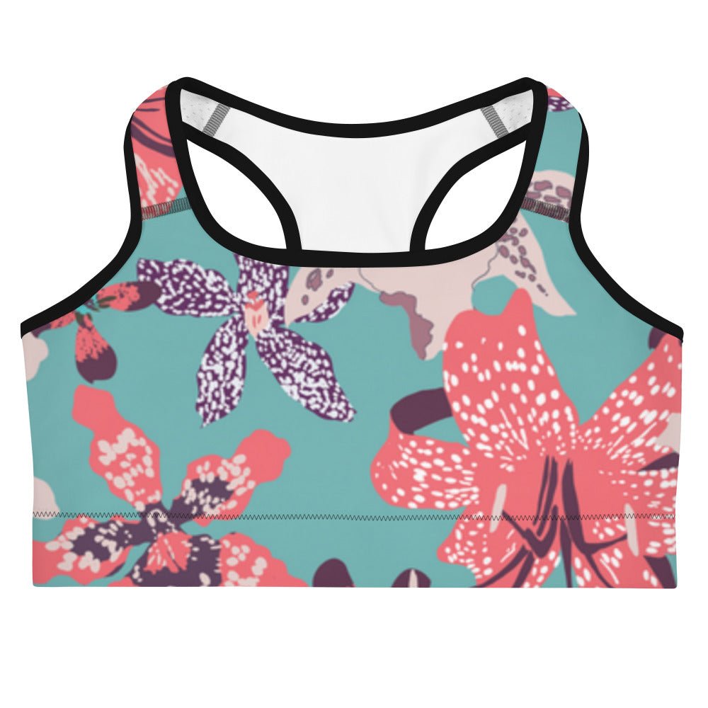 The Chelsea Performance Bra, high-compression performance sports bra featuring a vibrant tropical floral print in turquoise and pink.
