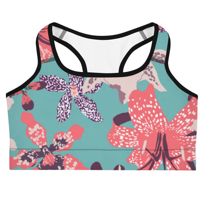 The Chelsea Performance Bra, high-compression performance sports bra featuring a vibrant tropical floral print in turquoise and pink.