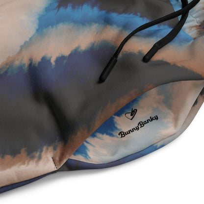 Close-up of the elastic waistband and drawstring on the Côte d'Azur Flow abstract print joggers.
