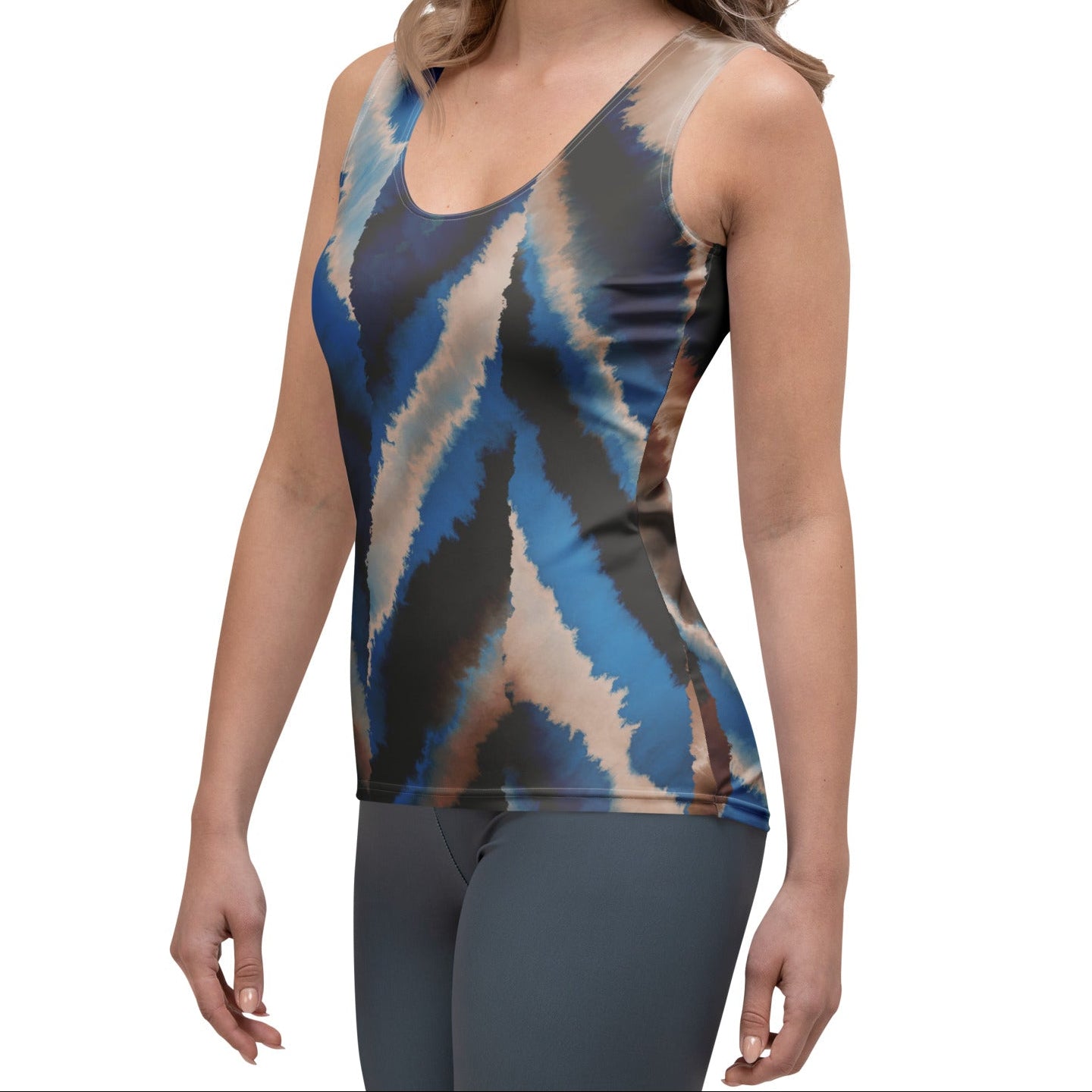 Model wearing the body-hugging Côte d'Azur Performance Tank paired with matching abstract brushstroke print bottoms.