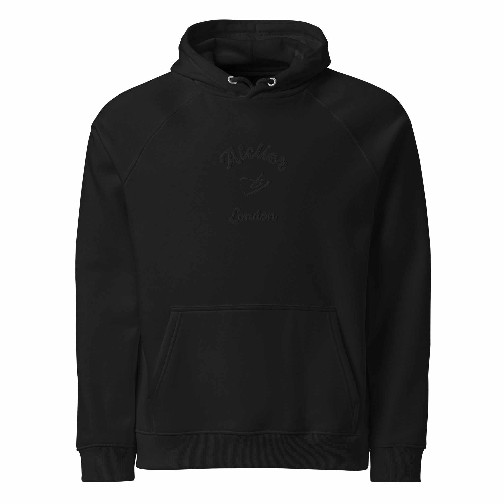 A close up of The Atelier Hoodie showing the branded atelier heart logo