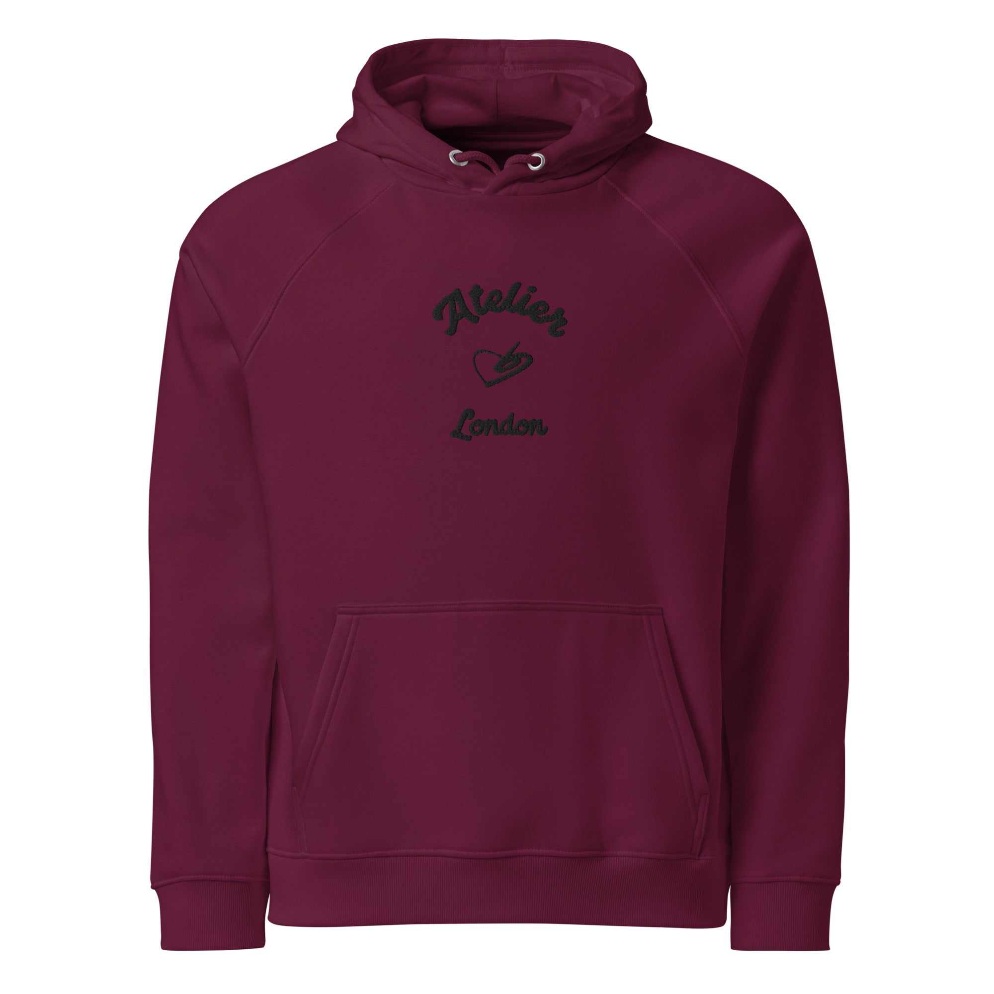A close up of The Atelier Hoodie showing the branded atelier heart logo