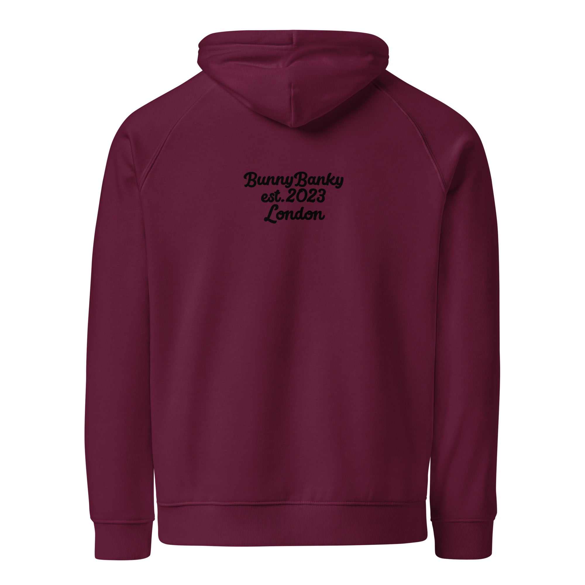 A close up of he Atelier Hoodie showing the branded heritage signature at the back