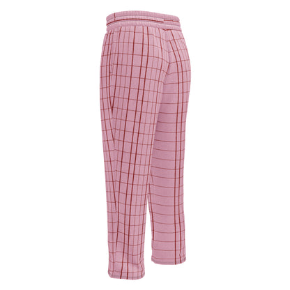 The Edinburgh Flow Joggers.Pink plaid  relaxed joggers with a black drawstring waist, shown on a plain white background.