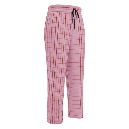 The Edinburgh Flow Joggers.Pink plaid  relaxed joggers with a black drawstring waist, shown on a plain white background.
