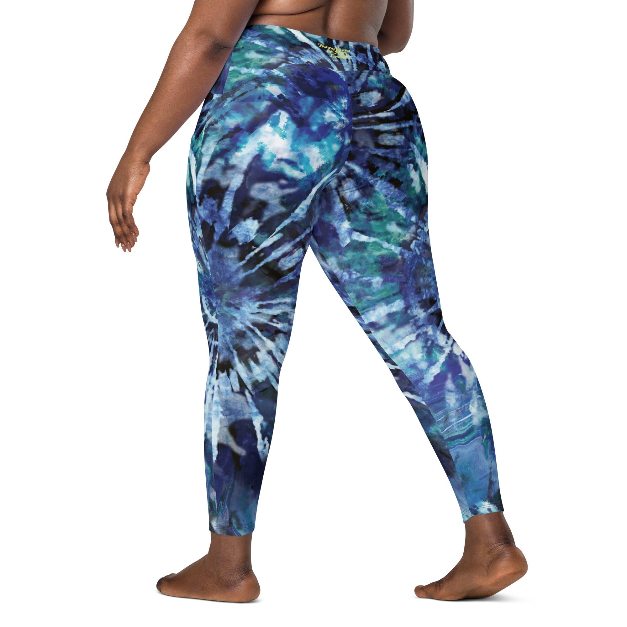 High-waisted Fulham leggings with blue tie-dye pattern and side pockets, semi-compression fit for workouts and casual wear