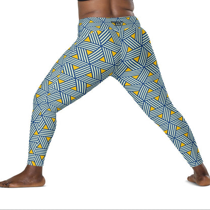 model wearing the Geneva Sculpt Leggings featuring a pattern of interweaved blue lines in yellow background.