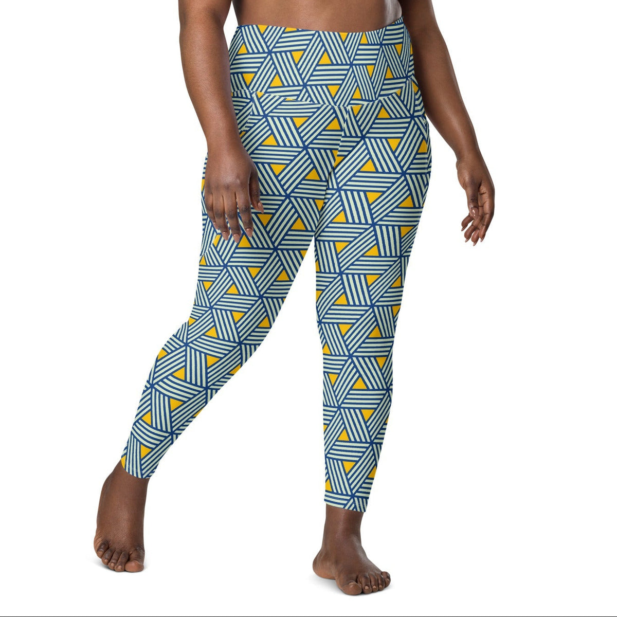 model wearing the Geneva Sculpt Leggings featuring a pattern of interweaved blue lines in yellow background.