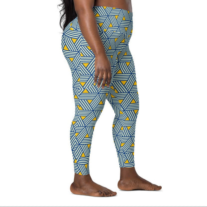 model wearing the Geneva Sculpt Leggings featuring a pattern of interweaved blue lines in yellow background.