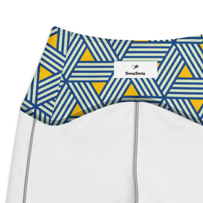 the Geneva Sculpt Leggings featuring a pattern of interweaved blue lines in yellow background.