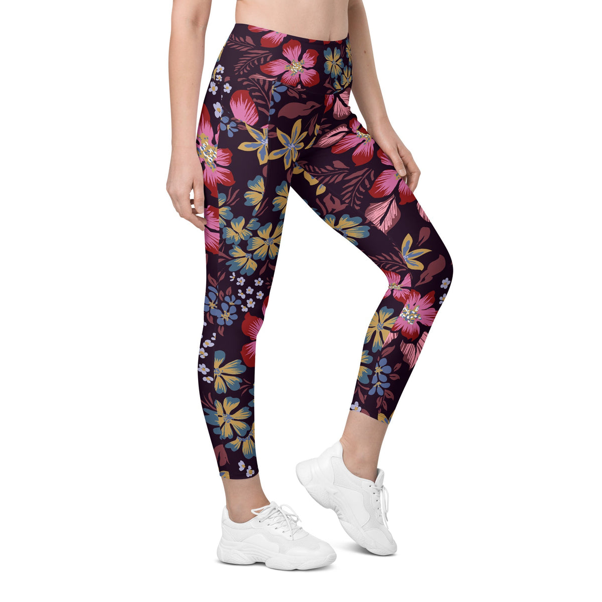 model wearing the Green Park  sculpt leggings in blue, pink, yellow floral pattern on burgundy background
