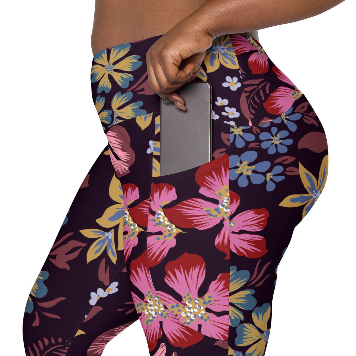 model wearing the Green Park  sculpt leggings in blue, pink, yellow floral pattern on burgundy background
