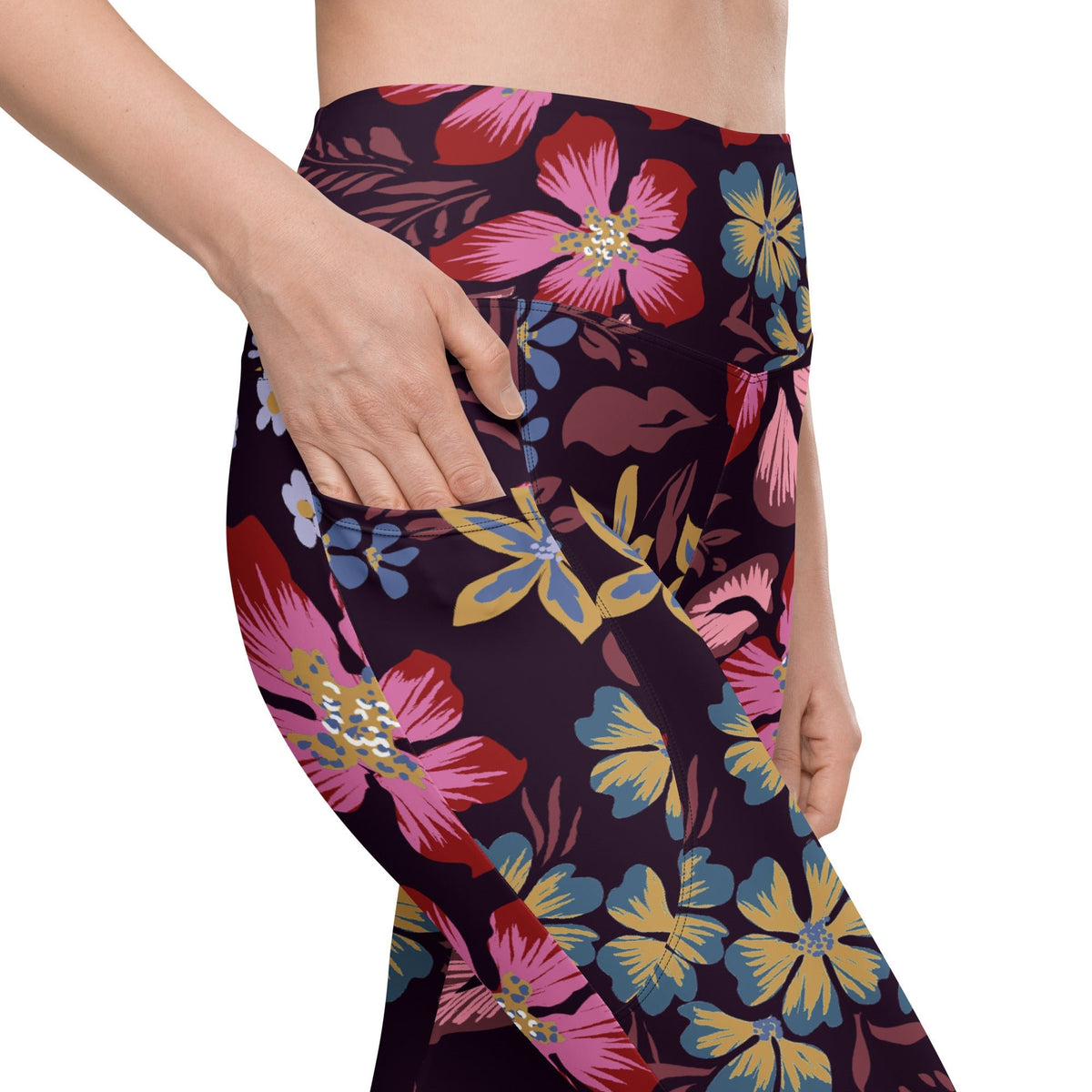 model wearing the Green Park  sculpt leggings in blue, pink, yellow floral pattern on burgundy background