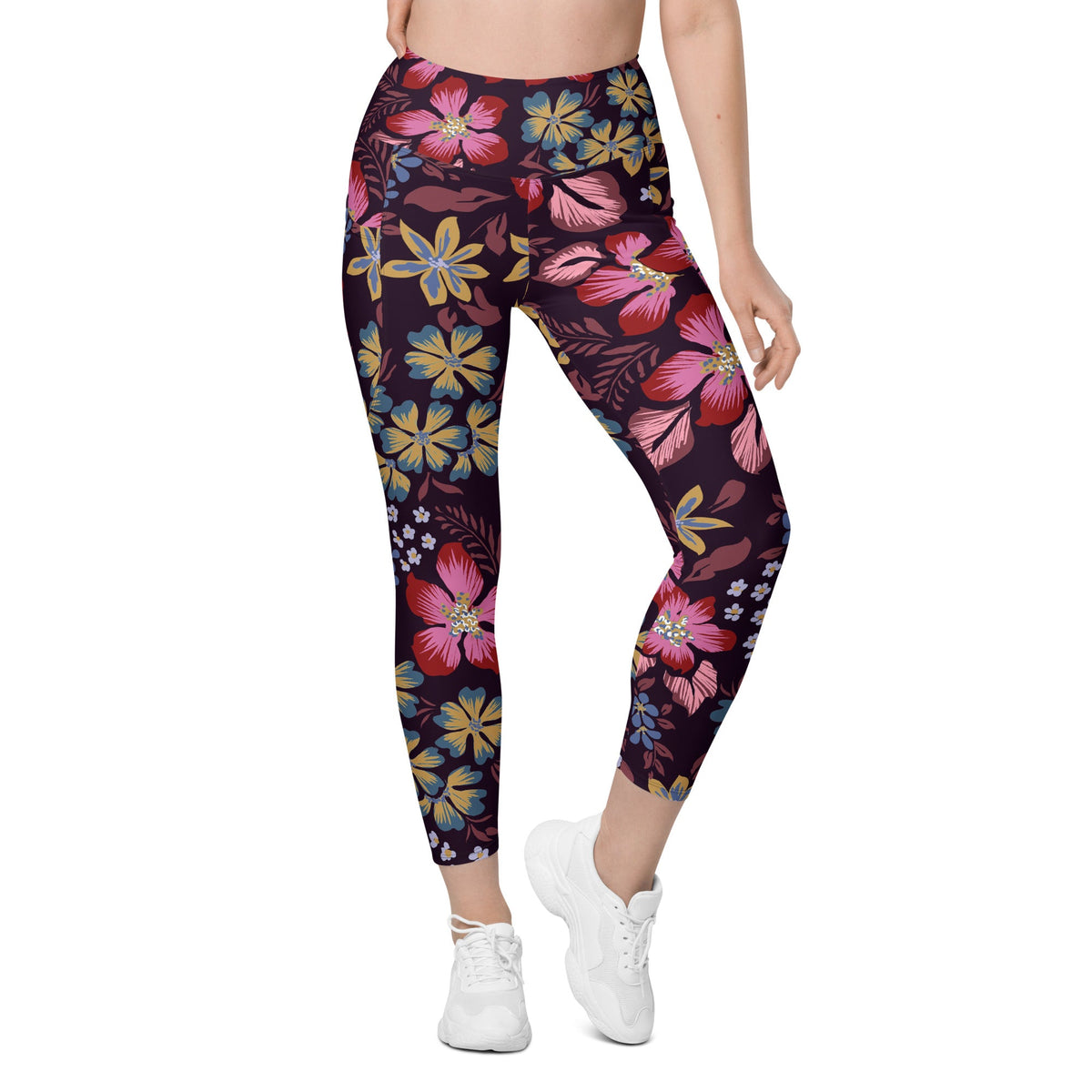 model wearing the Green Park  sculpt leggings in blue, pink, yellow floral pattern on burgundy background