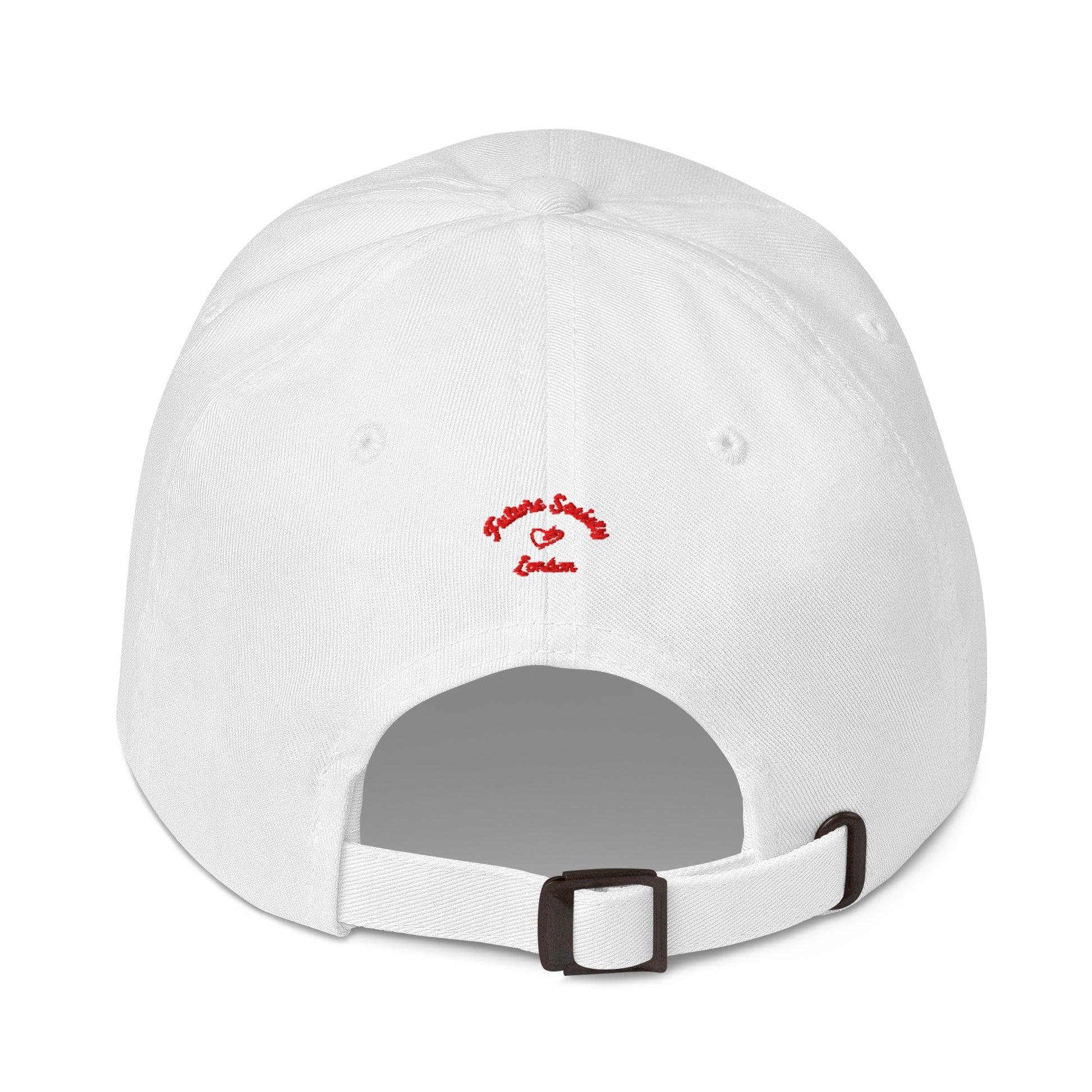 A close up of The Heritage Cap in white showing the heritage branded signature embroidered in red