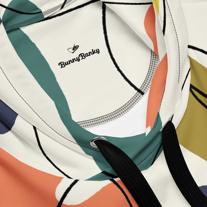 A close-up of The Joie de Vivre Hoodie's print, highlighting the sharp geometric shapes and vibrant colours of the Suprematist-inspired abstract art on the recycled polyester fabric.
