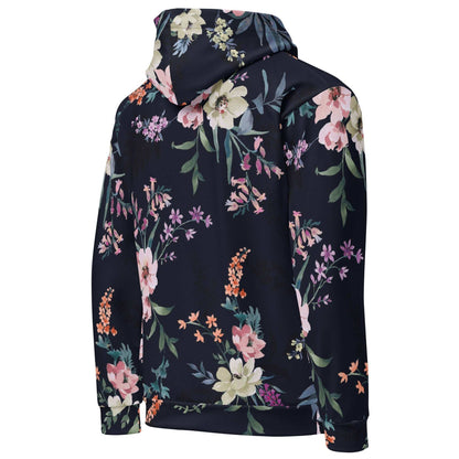 Side view of the Kew Botanical Hoodie against a white background, showcasing the intricate navy and blush wildflower print and the white BunnyBankY London arched branding.