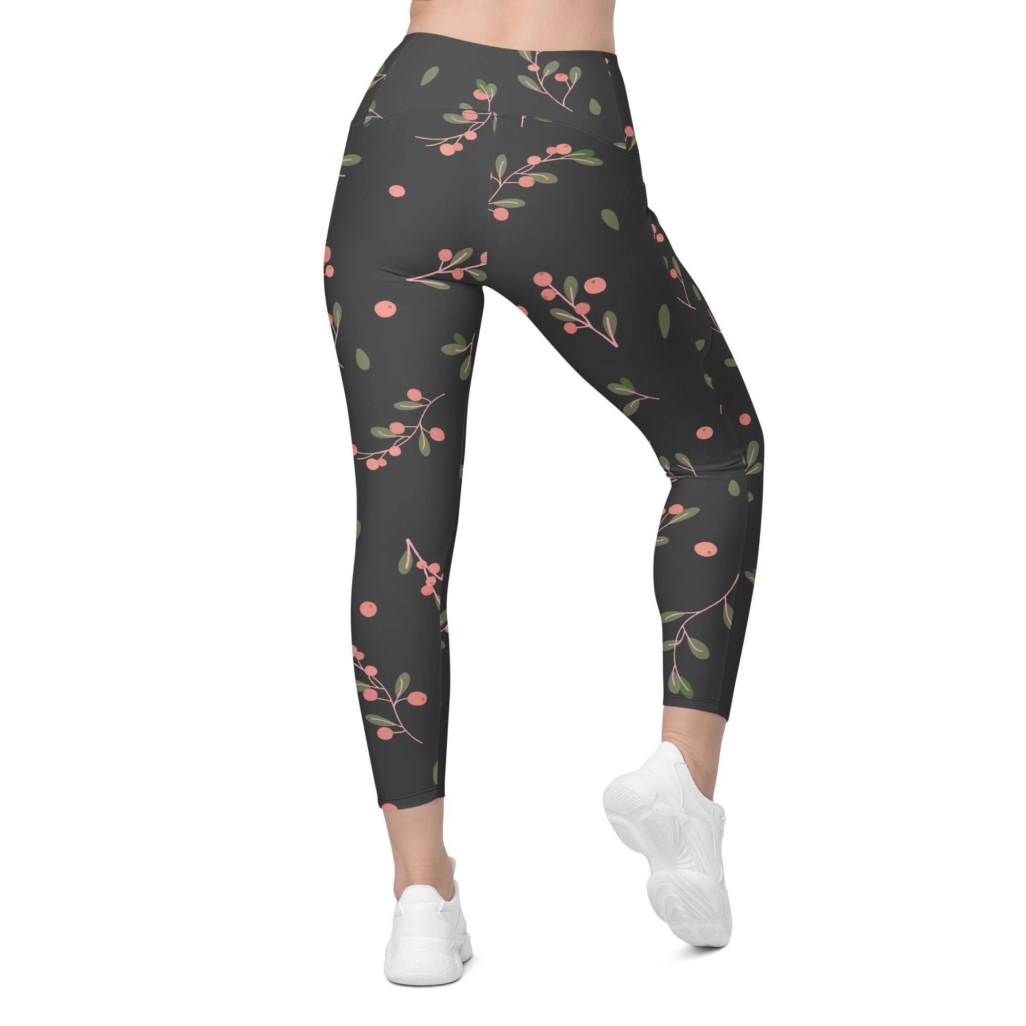High-waisted Manchester Sculpt Leggings with pink floral print on khaki green, mild compression, dual side pockets, and UPF 50+ sun protection.