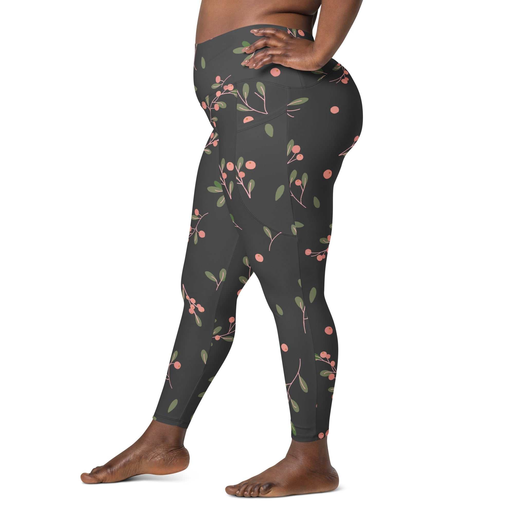 Side view of black Manchester Sculpt Leggings with pink floral print and high-waist fit on person