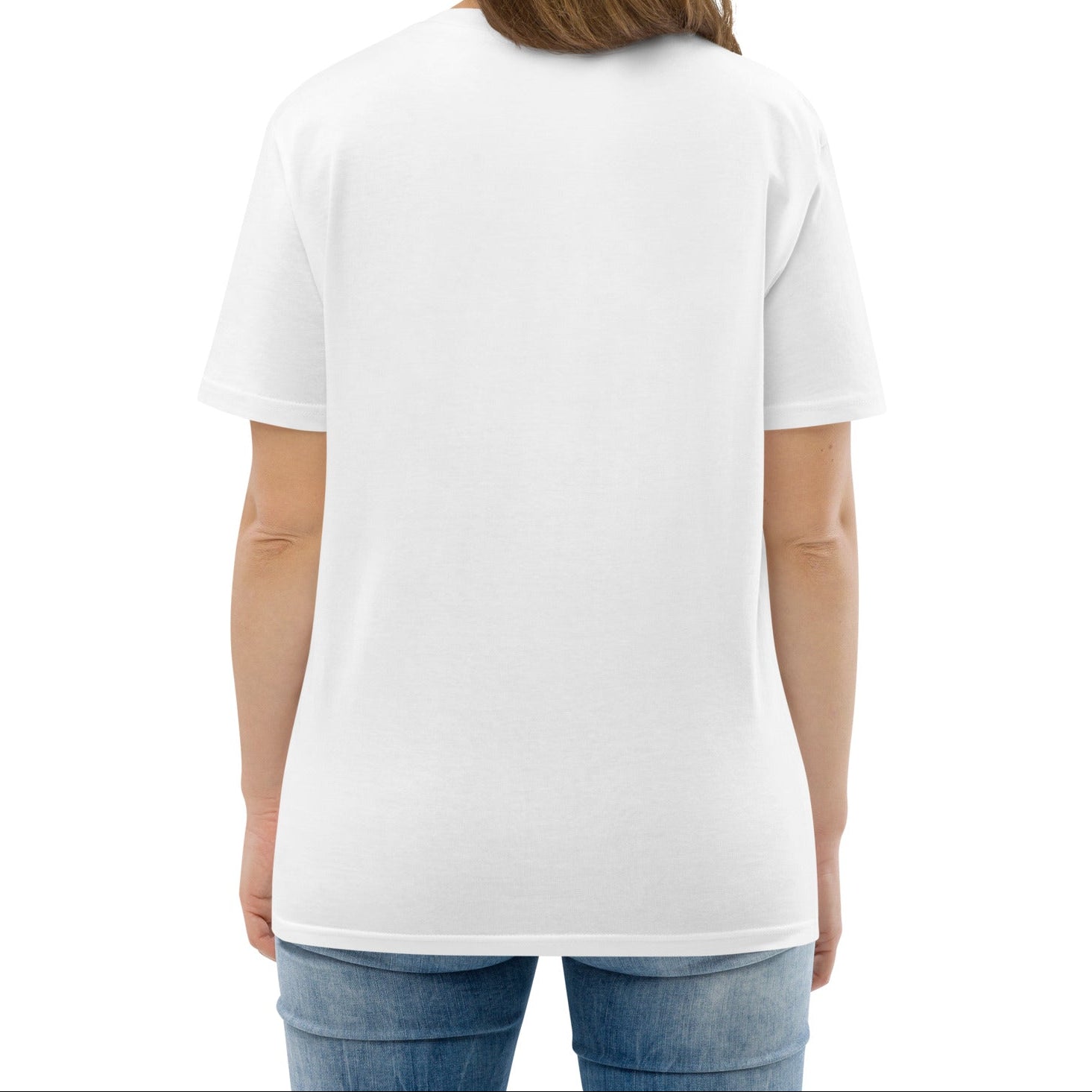 A model wearing The Manifesto Tee in 100% organic cotton, showing the 