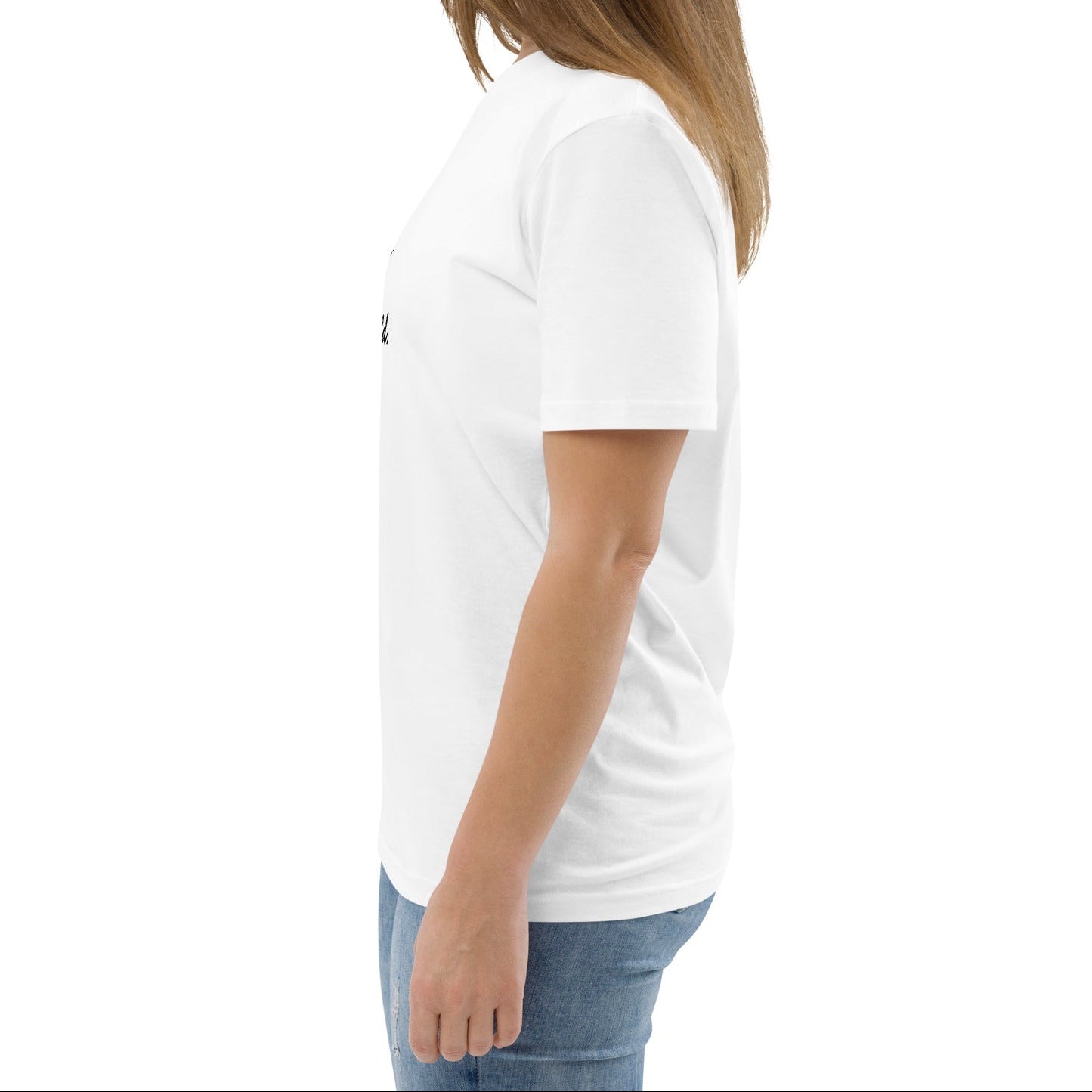 A model wearing The Manifesto Tee in 100% organic cotton, showing the 