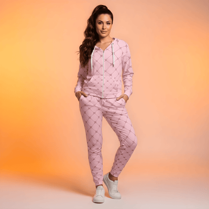 AI Proprietary Model wearing the full Mayfair  Set, showing the burgundy and pink geometric monogram print on both the zip hoodie and the slim fit joggers, emphasizing the cohesive, tailored look of the recycled polyester set.