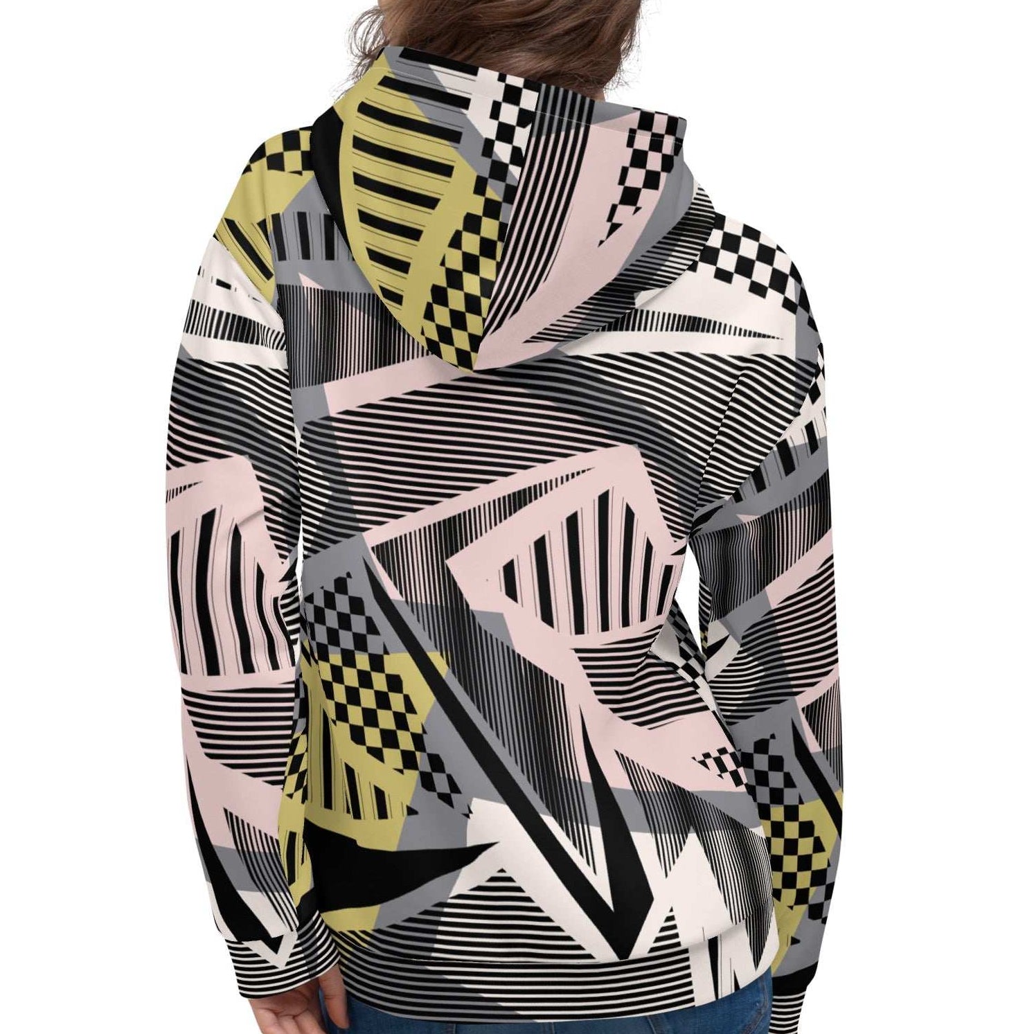 A model wearing the Miami Resort Hoodie. The image highlights the Art Deco-inspired pattern of checkers and pinstripes in soft pink, sand, and olive tones, featuring red London branding.