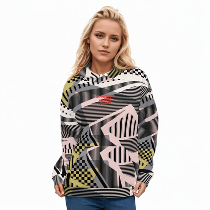 A BunnyBankY AI proprietary model wearing the Miami Resort Hoodie. The image highlights the Art Deco-inspired pattern of checkers and pinstripes in soft pink, sand, and olive tones, featuring red London branding.