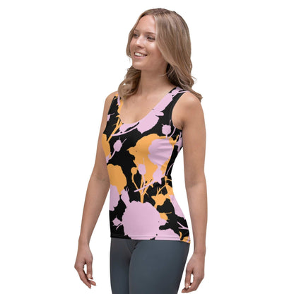 A model wearing The Miami Performance Tank, showing the second-skin fit and the dynamic pink and orange splashes print.