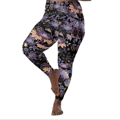 Model wearing the Milano sculpt leggings in purple and beige floral pattern on a black fabric.