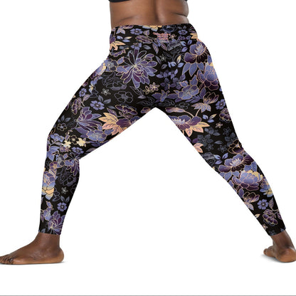 Model wearing the Milano sculpt leggings in purple and beige floral pattern on a black fabric.