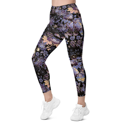 Model wearing the Milano sculpt leggings in purple and beige floral pattern on a black fabric.