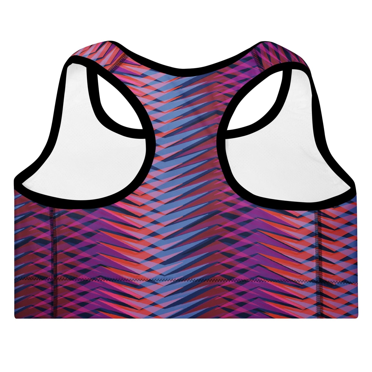 A close-up of The Moorgate Performance Bra's graphic arrow print, showing the premium recycled fabric and the "graphic knit" pattern of pink, orange, and blue.