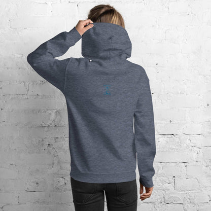 A model wearing The Mykonos Hoodie, showing the relaxed fit, drawstring hood, and the  hourglass print on the back center.