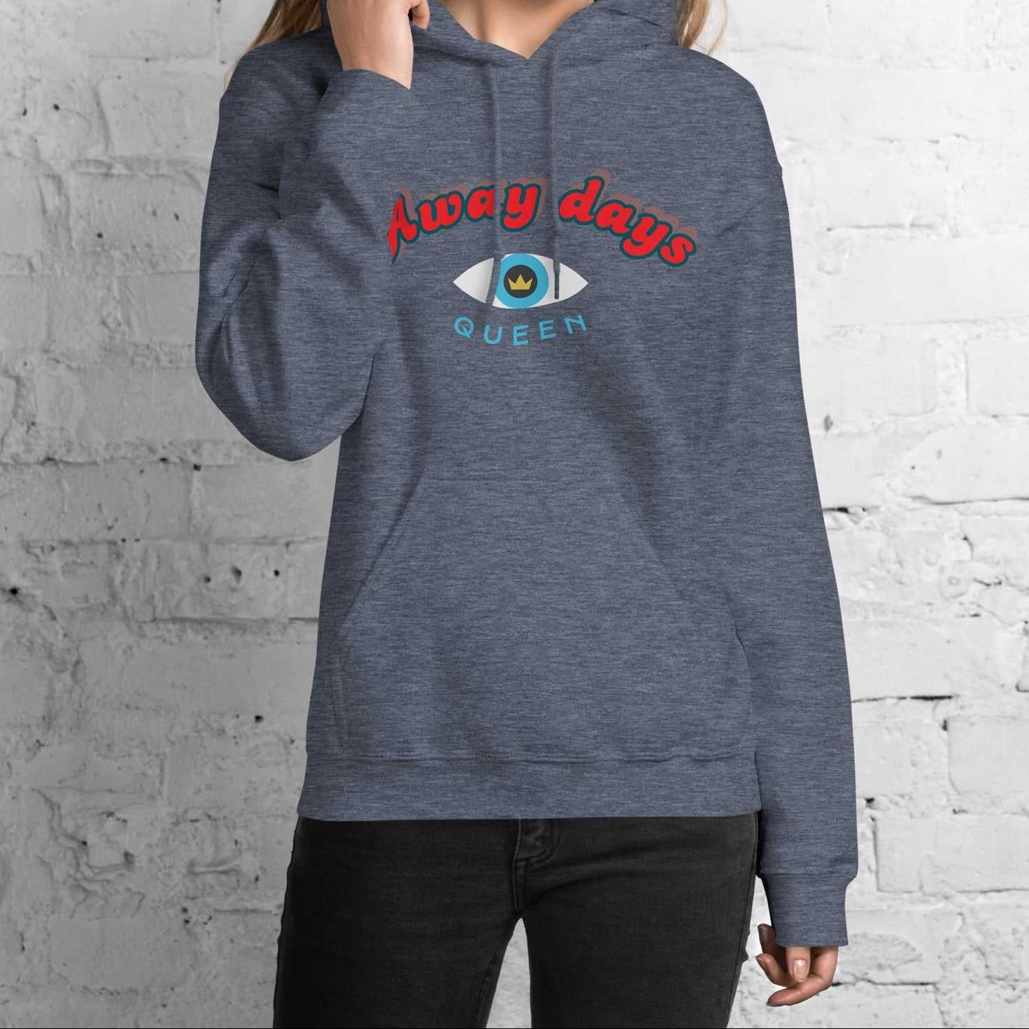 A model wearing The Mykonos Hoodie, showing the relaxed fit, drawstring hood, and the  Crown and 