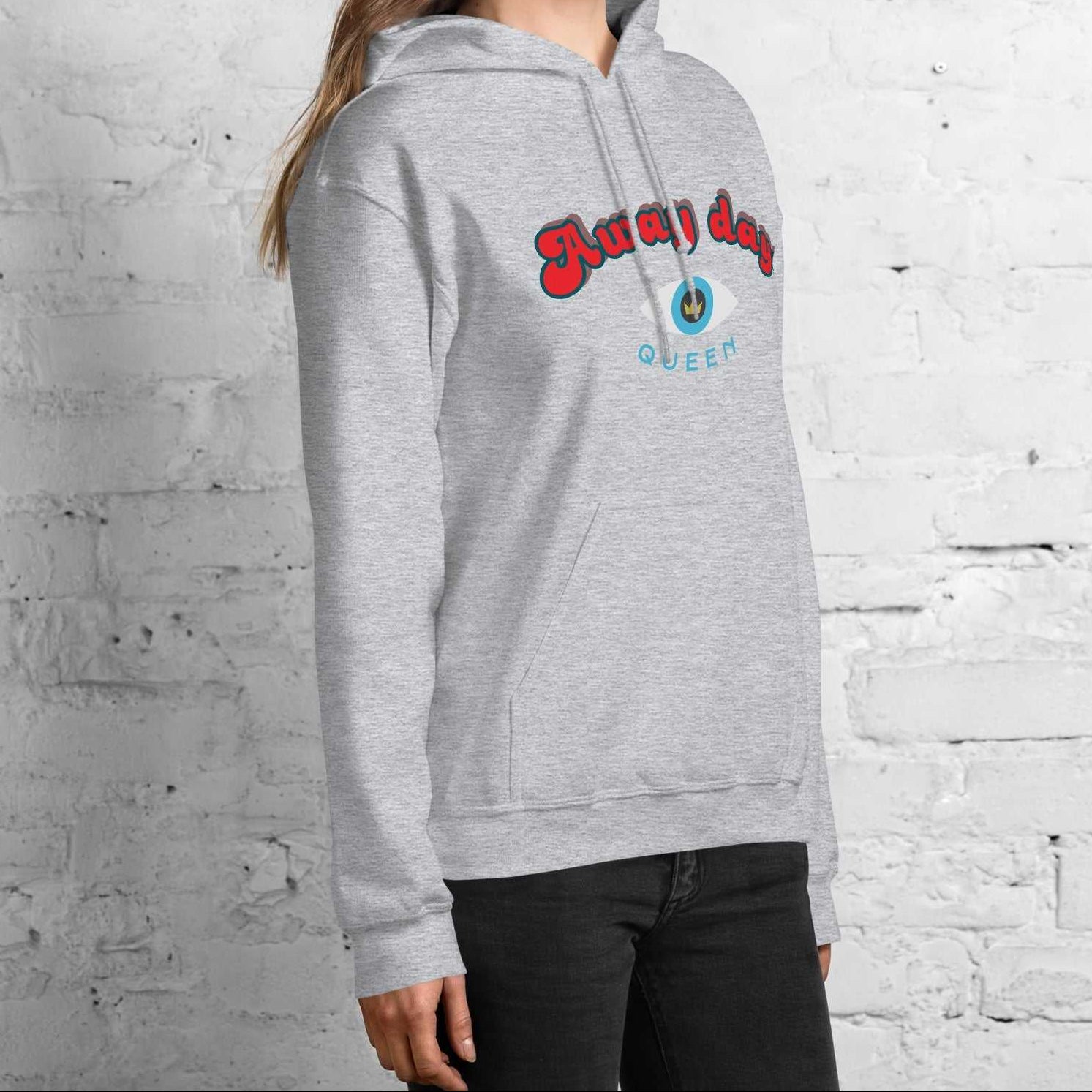 A model wearing The Mykonos Hoodie, showing the relaxed fit, drawstring hood, and the  Crown and 