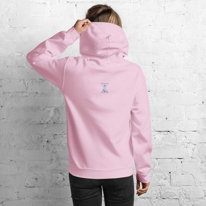 A model wearing The Mykonos Hoodie, showing the relaxed fit, drawstring hood, and the  hourglass print on the back center.